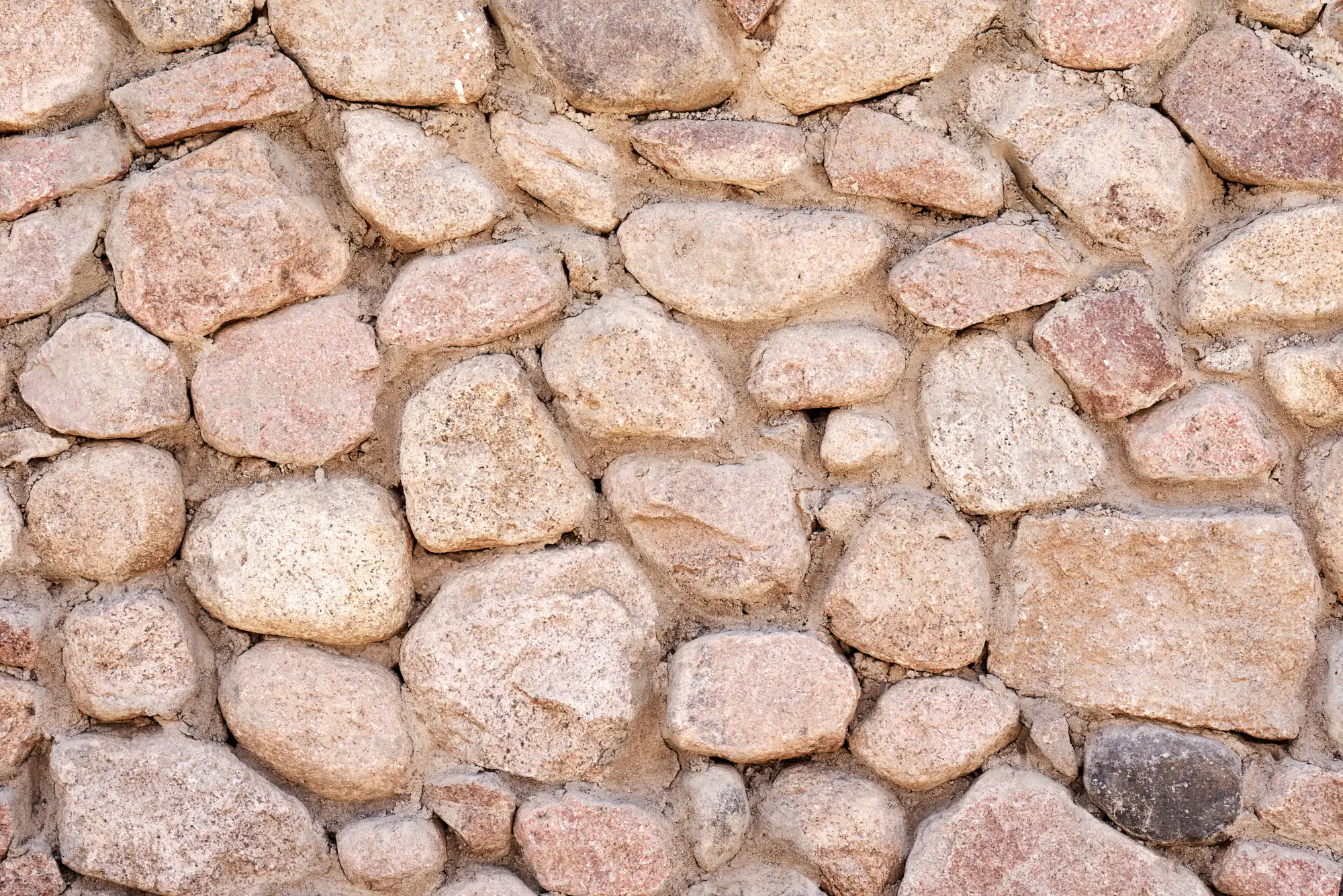 Masonry wall of stones, pattern texture background